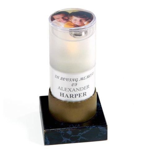 white flickering flameless candle with personalized label 
