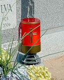 red LED pillar candle with cross side Mounted to gravestone 